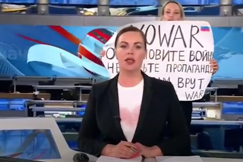 Marina Ovsyannikova walked onto set during the country's main news programme "Vremya" (Time) and held up a sign to the camera protesting President Vladimir Putin's war in Ukraine, warning that viewers were being "lied to." Image: YouTube screenshot.