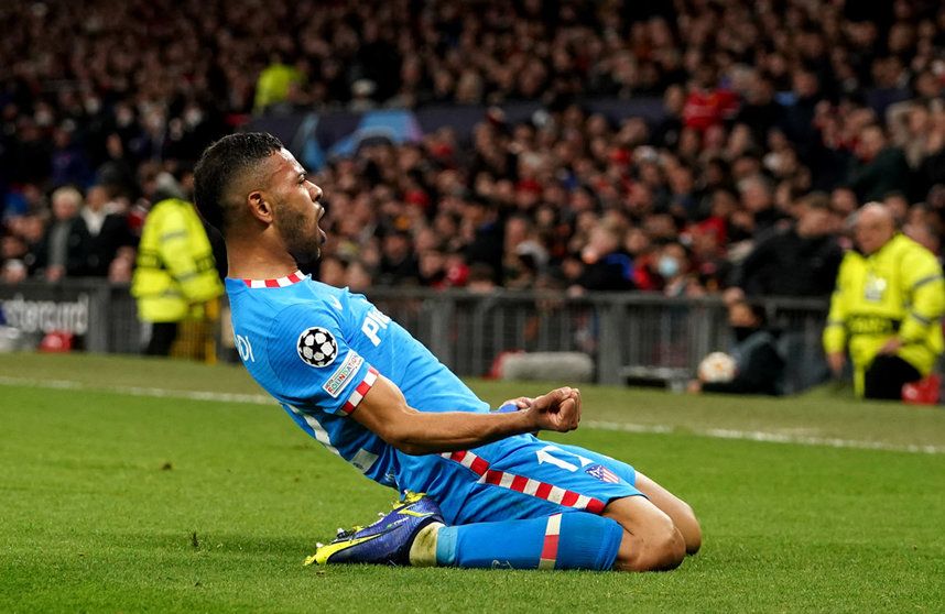 15 March 2022, United Kingdom, Manchester: Atletico Madrid's Renan Lodi celebrates scoring his side's first goal during the UEFA Champions League round of sixteen second leg soccer match between Manchester United and Atletico Madrid at Old Trafford. Photo: Martin Rickett/PA Wire/dpa.