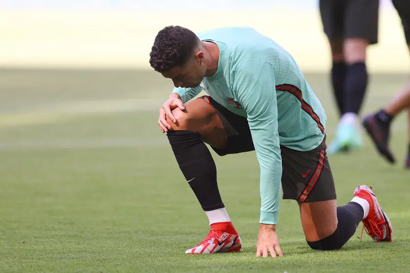 FILED - 18 June 2021, Bavaria, Munich: Portugal's Cristiano Ronaldo takes part in a training session at for the team at the Allianz Arena ahead of Saturday's UEFA EURO 2020 Group F soccer match against Germany. Cristiano Ronaldo and his partner have announced that one of their newborn twins has died. Photo: Christian Charisius/dpa.