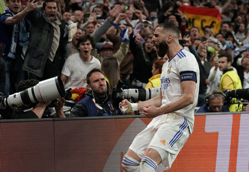 04 May 2022, Spain, Madrid: Real Madrid's Karim Benzema celebrates scoring his sides third goal during the UEFA Champions League semi final, second leg soccer match between Real Madrid and Manchester City at the Santiago Bernabeu. Photo: Nick Potts/PA Wire/dpa.