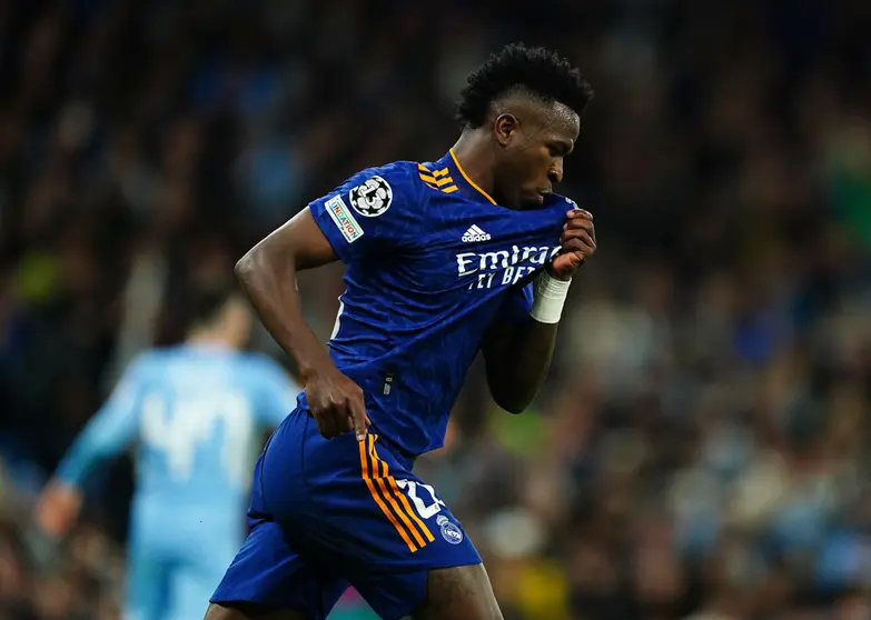 26 April 2022, United Kingdom, Manchester: Real Madrid's Vinicius Junior celebrates scoring his side's second goal during the UEFA Champions League Semi Final, First Leg, soccer match between Manchester City and Real Madrid at the Etihad Stadium. Photo: Mike Egerton/PA Wire/dpa.