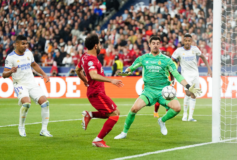 28 May 2022, France, Paris: Real Madrid's Thibaut Courtois saves from Liverpool's Mohamed Salah during the UEFA Champions League final soccer match between Liverpool FC and Real Madrid CF at the Stade de France. Photo: Nick Potts/PA Wire/dpa.