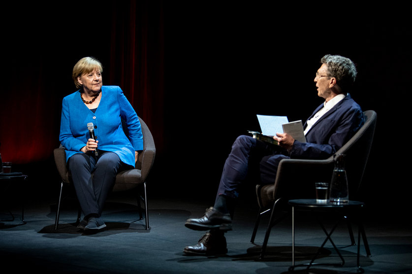 07 June 2022, Berlin: Former German Chancellor Angela Merkel (R) answers questions from journalist and author Alexander Osang at the Berliner Ensemble. Photo: Fabian Sommer/dpa.