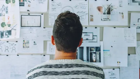 Man student ideas board