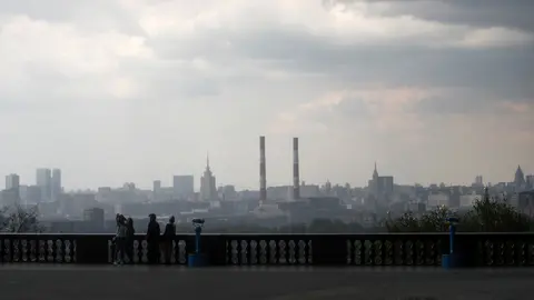 FILE PHOTO: People gather at a sightseeing point amid the coronavirus disease (COVID-19) outbreak in Moscow, Russia May 5, 2020. REUTERS/Maxim Shemetov