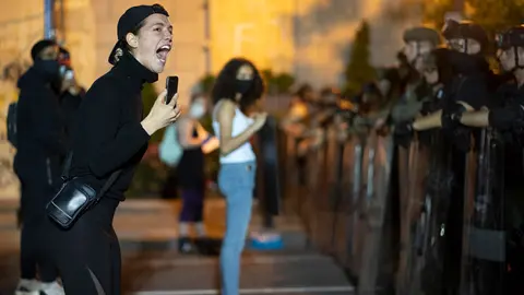 03 June 2020, US, Washington: A woman tears up while shouting at officers during a protest following the violent death of the African-American George Floyd by a white policeman in Minneapolis. Photo: Sait Serkan Gurbuz/ZUMA Wire/dpa
