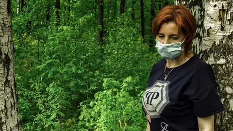 Woman-mask-forest