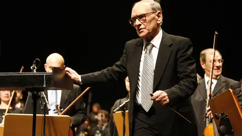 Italian film composer Ennio Morricone conducts during a concert in the Vienna Stadthalle. Morricone has died in Rome at the age of 91. Photo: Herbert P. Oczeret/APA/dpa