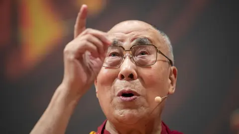 20 September 2018, Heidelberg: Dalai Lama, spiritual leader of the Tibetans, gesturing during his farewell words. The Dalai Lama, turned 85 on Monday, with followers holding prayers for him to have a long life as well as organizing global events online to dedicate to him a "Year of Gratitude." Photo: Marijan Murat/dpa
