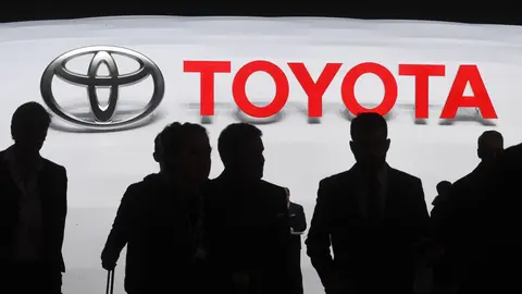 07 March 2018, Switzerland, Geneva: A logo of the car manufacturer Toyota at the 89th Geneva Motor Show. Toyota Motor forecasts its net profit for the current financial year will drop 64.1 per cent from the previous year to 730 billion yen (6.9 billion dollars) due to the fallout from the Coronavirus pandemic. Photo: Uli Deck/dpa