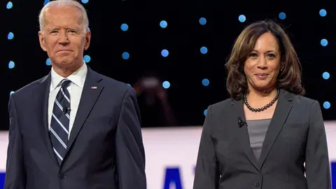 31 July 2019, US, Detroit: US Democratic presidential candidate and former Vice President Joe Biden (L) and California Senator Kamala Harris attend a Democratic debate. Biden, the presumptive Democratic presidential nominee, has selected California Senator Kamala Harris as his running mate for the US presidential election in November. Photo: Brian Cahn/dpa.