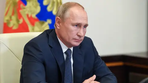 11 August 2020, Russia, Moscow: Russian President Vladimir Putin chairs a cabinet meeting via video conference at the Kremlin. Photo: Kremlin/dpa.