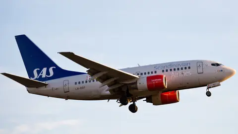 FILED - 16 February 2014, Berlin: An Airbus aircraft of the Scandinavian Airlines SAS lands at Tegel Airport. SAS recorded huge losses in the last quarter due to the collapse of air travel demand during the coronavirus pandemic, the Scandinavian airline announced on Tuesday. Photo: Bernd von Jutrczenka/dpa.
