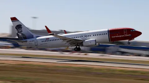 FILED - 27 April 2019, Spain, Palma: A Norwegian plane takes off from Palma airport. Low-cost airline Norwegian Air Shuttle plans to cancel thousands of flights due to the spread of the coronavirus. Norwegian Airlines called for additional financial aid on Friday, saying it would not survive into 2021 due to huge losses stemming from the coronavirus pandemic. Photo: Clara Margais/dpa.