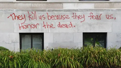 24 August 2020, US, Kenosha: Graffiti can be seen on the front of the Kenosha County Court House after a demonstration following the shooting of Jacob Blake, an African-American man, by a white police officer the day before. Photo: Mark Hertzberg/dpa.