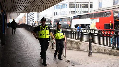 08 September 2020, England, Birmingham: Police officers patrol in Birmingham city centre days after a lone knifeman carried out a stabbing spree which saw one dead and several injured. Photo: Jacob King/dpa.