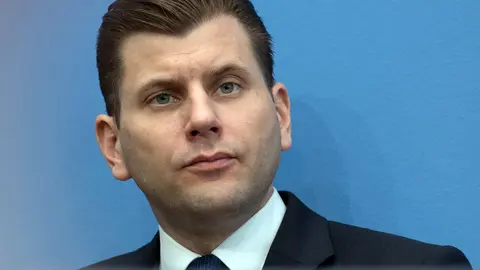 FILED - 12 March 2018, Berlin: Christian Lueth, then press spokesperson of the Alternative for Germany party (AfD), attends a press conference. Germany's right-wing populist Alternative for Germany (AfD) party has distanced itself from former spokesperson Christian Lueth after he was apparently recorded by reporters talking about "gassing" migrants. Photo: Soeren Stache/dpa.