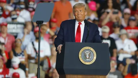 October 12, 2020, Sanford, Florida, USA: President Donald Trump speaks to a crowd of supporters at Orlando Sanford International Airport on Monday, Oct. 12, 2020 in Sanford. (Credit Image: © Luis Santana/Tampa Bay Times via ZUMA Wire Photo: Luis Santana/Tampa Bay Times via ZUMA Wire/dpa.