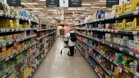 woman-shopping-cart-City-Market-food-store-by-foreigner.fi