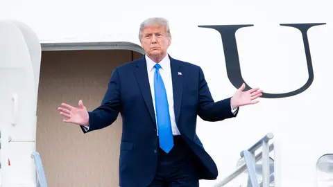 15 October 2020, US, Miami: US President Donald Trump disembarks from Air Force One upon his arrival at Miami International Airport on the way to campaign events. Photo: Orit Ben-Ezzer/dpa.