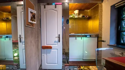 30 October 2020, Bremen: The interior of the smallest house in Bremen. The seven square metre small house in the Schnoor quarter popular with tourists is for sale. Photo: Sina Schuldt/dpa.