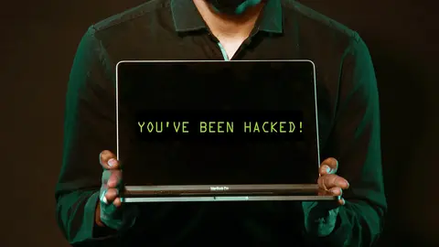 Hacker-hacking-data-breach-by-pexels