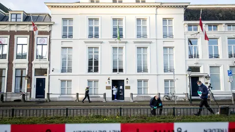 12 November 2020, Netherlands, The Hague: Police officers investigate outside the Saudi Arabian embassy in The Hague, after several shots were fired at the embassy. Bullets have been fired at several windows and bullet casings have been recovered. Photo: Sem Van Der Wal/dpa.