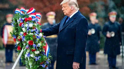 11 November 2020, US, Arlington: US President Donald Trump places a wreath during a Wreath-Laying Ceremony at the Tomb of the Unknown Soldier at Arlington National Cemetery during the annual Veterans Day observances. Photo: Elizabeth Fraser/Planet Pix via ZUMA Wire/dpa.