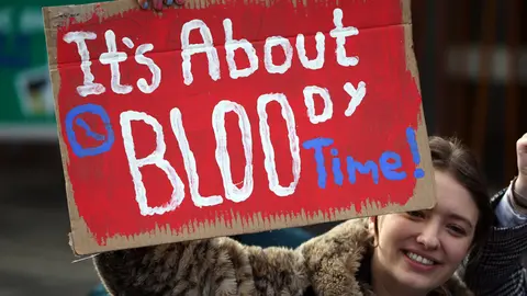 EMBARGOED TO 0001 TUESDAY NOVEMBER 24 File photo dated 25/02/20 of a supporter of the Period Products bill at a rally outside Parliament in Edinburgh. Scotland could become the first country to make period products freely available if MSPs vote for new legislation later on Tuesday. Photo: Andrew Milligan/PA Wire/dpa.