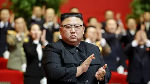 HANDOUT - 11 January 2021, North Korea, Pyongyang: A picture provided by the North Korean state news agency (KCNA) on 11 January 2021, shows North Korean Leader Kim Jong-un attending the sixth day of the eighth congress of the ruling Workers' Party. Photo: -/KCNA/dpa - ATTENTION: editorial use only and only if the credit mentioned above is referenced in full