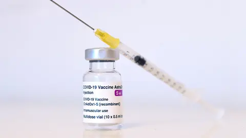 18 March 2021, Austria, Vienna: A vial of AstraZeneca's coronavirus vaccine can be seen at a vaccination centre. The European Medicines Agency deems the use of AstraZeneca's Covid-19 vaccine safe despite blood clot reports. Photo: Helmut Fohringer/APA/dpa