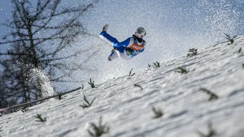 FILED - 25 March 2021, Slovenia, Planica: Norway's Daniel Andre Tande crashes during the men's flying hill event at the FIS Ski Jumping World Cup in Planica. Photo: Milos Vujinovic/SOPA Images via ZUMA Wire/dpa