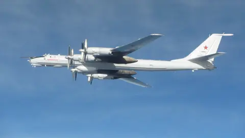 HANDOUT - 29 March 2021, United Kingdom, ---: A Russian Tu-142 Bear-F aircraft which was intercepted by Typhoons from the RAF Lossiemouth base on Monday morning after it was spotted operating near the UK. Photo: Sac Sian Stephens Raf/Ministry of Defence (MoD) via PA Media/dpa - ATTENTION: editorial use only and only if the credit mentioned above is referenced in full