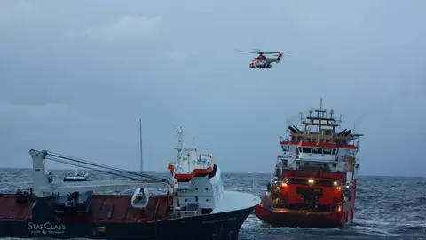 The dutch cargo ship Eemslift Hendrika is seen during the rescue operation. Photo: @kystvakten/KV Bergen.
