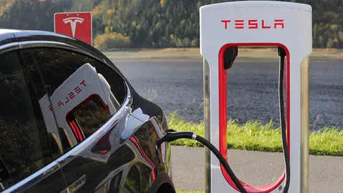 A Tesla electric car charging the batteries. Photo: Pixabay.