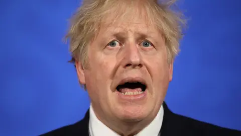 10 May 2021, United Kingdom, London: UK Prime Minister Boris Johnson speaks during a press conference in Downing Street to give updates on the the relaxing of coronavirus Covid-19 restrictions. Photo: Dan Kitwood/PA Wire/dpa