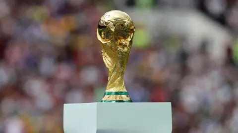 FILED - 15 July 2018, Russia, Moscow: The world cup trophy exhibited ahead of the FIFA World Cup 2018 soccer final match between France and Croatia at the Luzhniki Stadium in Moscow, Russia, 15 July 2018. FIFA has been given the mandate to make a feasibility study of hosting the men's and women's World Cup every two years instead of in a four-year cycle. Photo: Christian Charisius/dpa