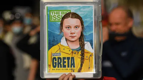 21 May 2021, Austria, Melbourne: A protester holds a poster of the Swedish climate activist Greta Thunberg during the School Strike 4 Life protest. Students across the country are calling on the federal government to stop using taxpayer money for fossil fuels. Photo: James Ross/AAP/dpa
