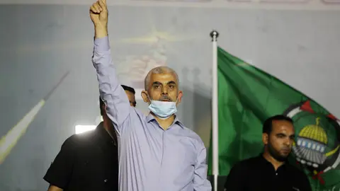 27 May 2021, Palestinian Territories, Khan Yunis City: Yahya Sinwar, leader of the Palestinian Hamas Islamist movement in the Gaza Strip, attends a military parade rally by Hamas military wing 'Izz ad-Din al-Qassam Brigades'. Photo: Ashraf Amra/APA Images via ZUMA Wire/dpa