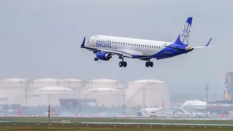 26 May 2021, Hessen, Frankfurt_Main: An aircraft of the Belarusian airline Belavia lands at Frankfurt Airport. Many European countries have closed their airspace to the airline after Belarusian authorities had forced a Ryanair plane, on its way from Greece to Lithuania, to land in Minsk with a dissident journalist on board. Photo: Andreas Arnold/dpa.