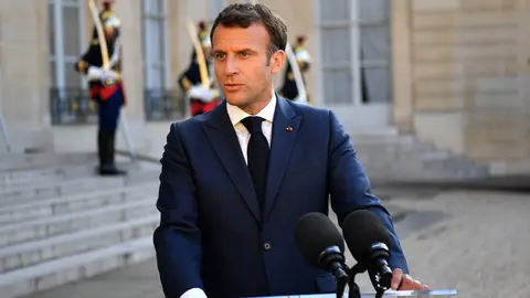 HANDOUT - 10 June 2021, France, Paris: French President Emmanuel Macron speaks during a press conference with North Macedonia's Prime Minister Zoran Zaev at the Elysee Palace. Photo: -/North Macedonian Government/dpa - ATTENTION: editorial use only and only if the credit mentioned above is referenced in full