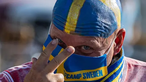 14 June 2021, Spain, Seville: A fan is seen before the start of the UEFA EURO 2020 Group E soccer match between Spain and Sweden at La Cartuja Stadium. Photo: Jose Luis Contreras/DAX via ZUMA Wire/dpa.
