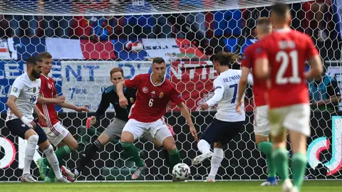 19 June 2021, Hungary, Budapest: France's Antoine Griezmann (R) scores his side's first goal during the UEFA EURO 2020 Group F soccer match between Hungary and France at the Puskas Arena. Photo: Robert Michael/dpa-Zentralbild/dpa