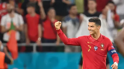 23 June 2021, Hungary, Budapest: Portugal's Cristiano Ronaldo celebrates scoring his side's first goal during the UEFA EURO 2020 Group F soccer match between Portugal and France at the Puskas Arena. Photo: Robert Michael/dpa-Zentralbild/dpa.