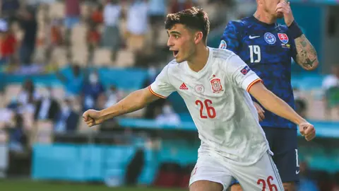 23 June 2021, Spain, Seville: Spain's Pedri celebrates his side's first goal during the UEFA EURO 2020 Group E soccer match between Slovakia and Spain at Estadio La Cartuja de Sevilla. Photo: Cezaro De Luca/dpa