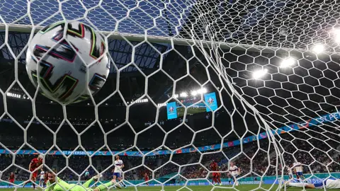 Ball 
12 June 2021, Russia, Saint Petersburg: Belgium's Thomas Meunier scores his side's second goal during the UEFA Euro 2020 Group B soccer match between Russia and Belgium at Krestovsky Stadium. Photo: Igor Russak/dpa