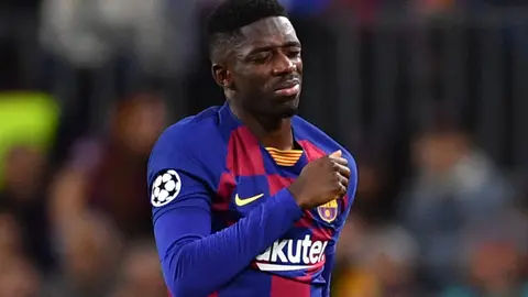 FILED - 27 November 2019, Spain, Barcelona: Barcelona's Ousmane Dembele reacts during the UEFA Champions League Group F soceer match between FC Barcelona and Borussia Dortmund at the Camp Nou Sradium. Barcelona will be without Ousmane Dembele for four months as the forward has undergone knee surgery. Photo: Marius Becker/dpa