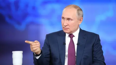 HANDOUT - 30 June 2021, Russia, Moscow: Russian President Vladimir Putin speaks during his annual "Direct Line with Vladimir Putin" live call-in show. Photo: -/Kremlin/dpa - ATTENTION: editorial use only and only if the credit mentioned above is referenced in full