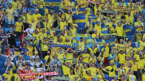 Sweden fans cheer in the stands during the UEFA EURO 2020 Group E soccer match between Sweden and Poland at St. Petersburg Stadium on June 23. Photo: Igor Russak/dpa