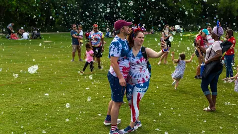 03 July 2021, US, McKinney: People gather at the McKinney Soccer Complex to attend the first public Independence Day-4th of July celebration since the coronavirus pandemic. Photo: Chris Rusanowsky/ZUMA Wire/dpa